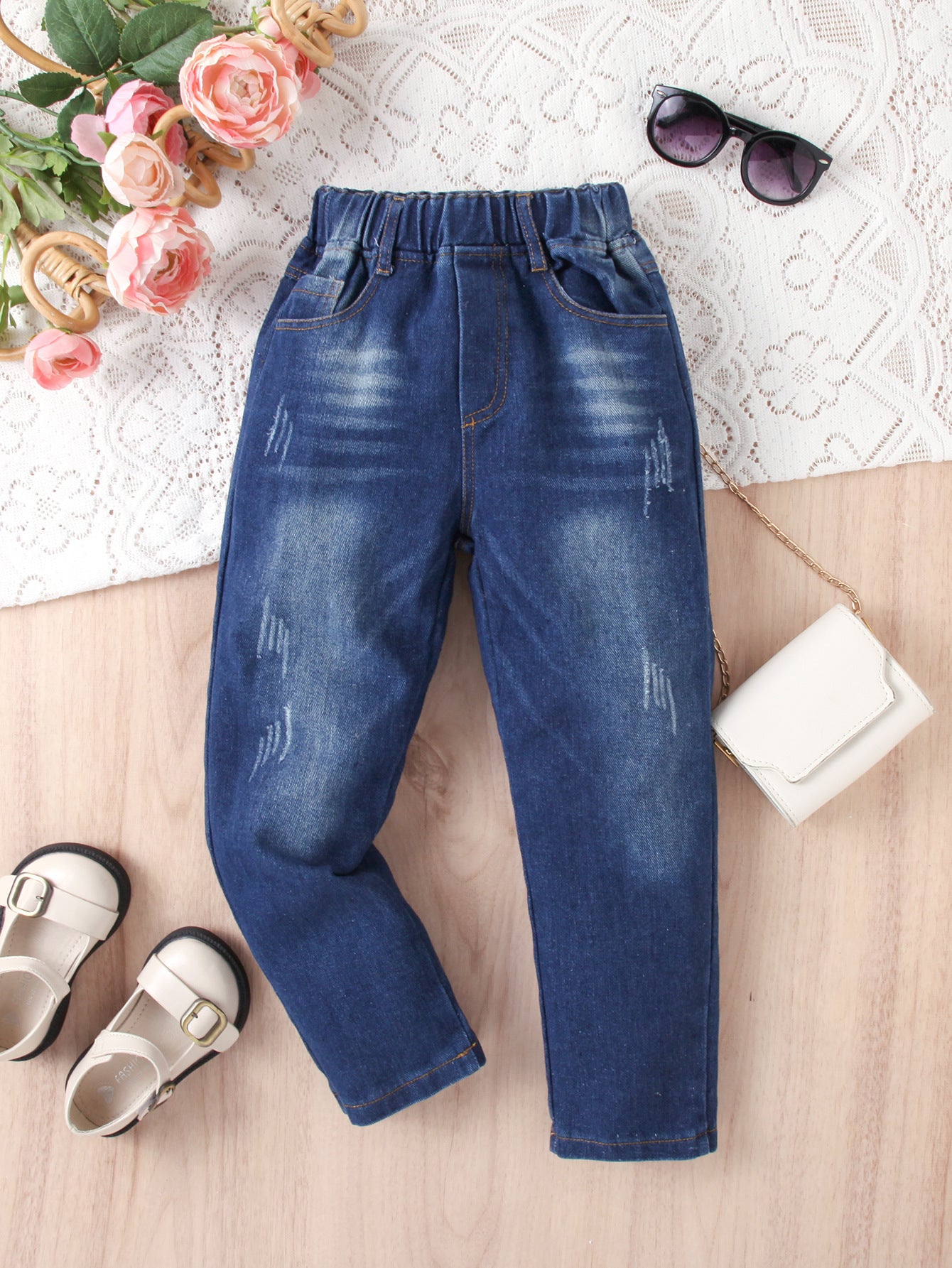 Jeans bambina elasticizzati effetto slavato – casual chic