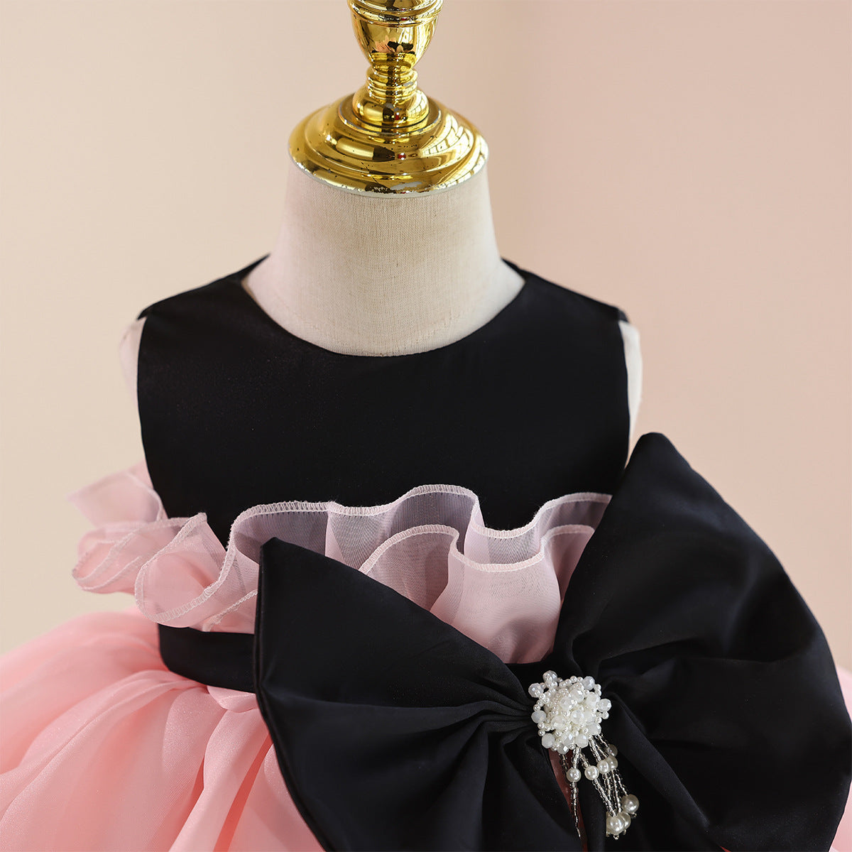 Abito elegante bambina rosa e nero con maxi fiocco
