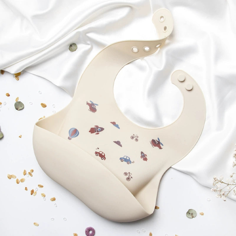 Bavetta in Silicone con Tasca – Mezzi di Trasporto, Antigoccia e Regolabile