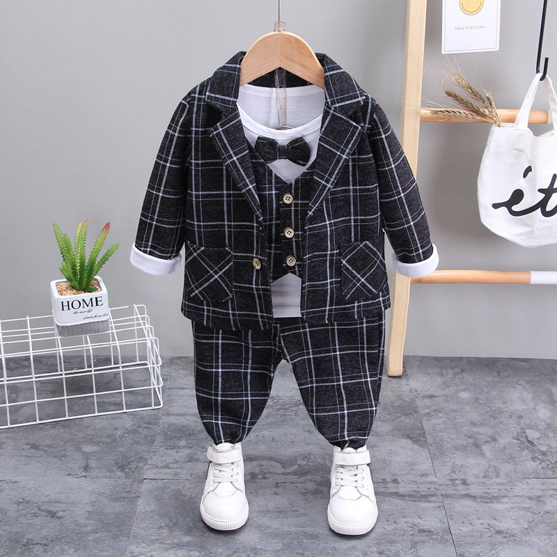 Completo elegante bambino con giacca, gilet, pantaloni e papillon – fantasia a quadri