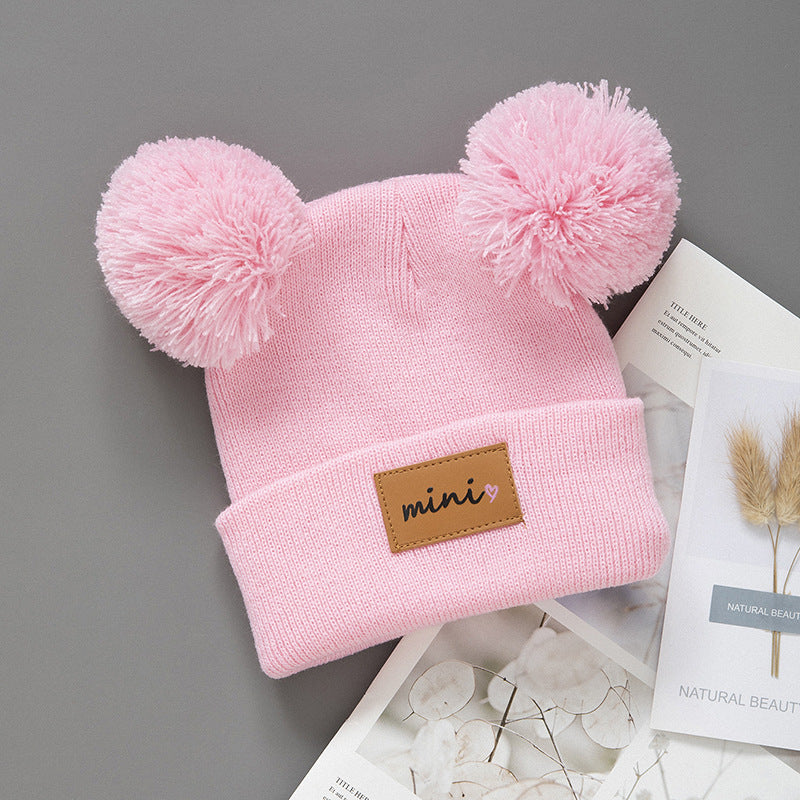Cappellino in maglia “Mini” con doppio pompon – Invernale, caldo e morbido