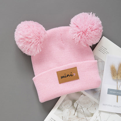 Cappellino in maglia “Mini” con doppio pompon – Invernale, caldo e morbido