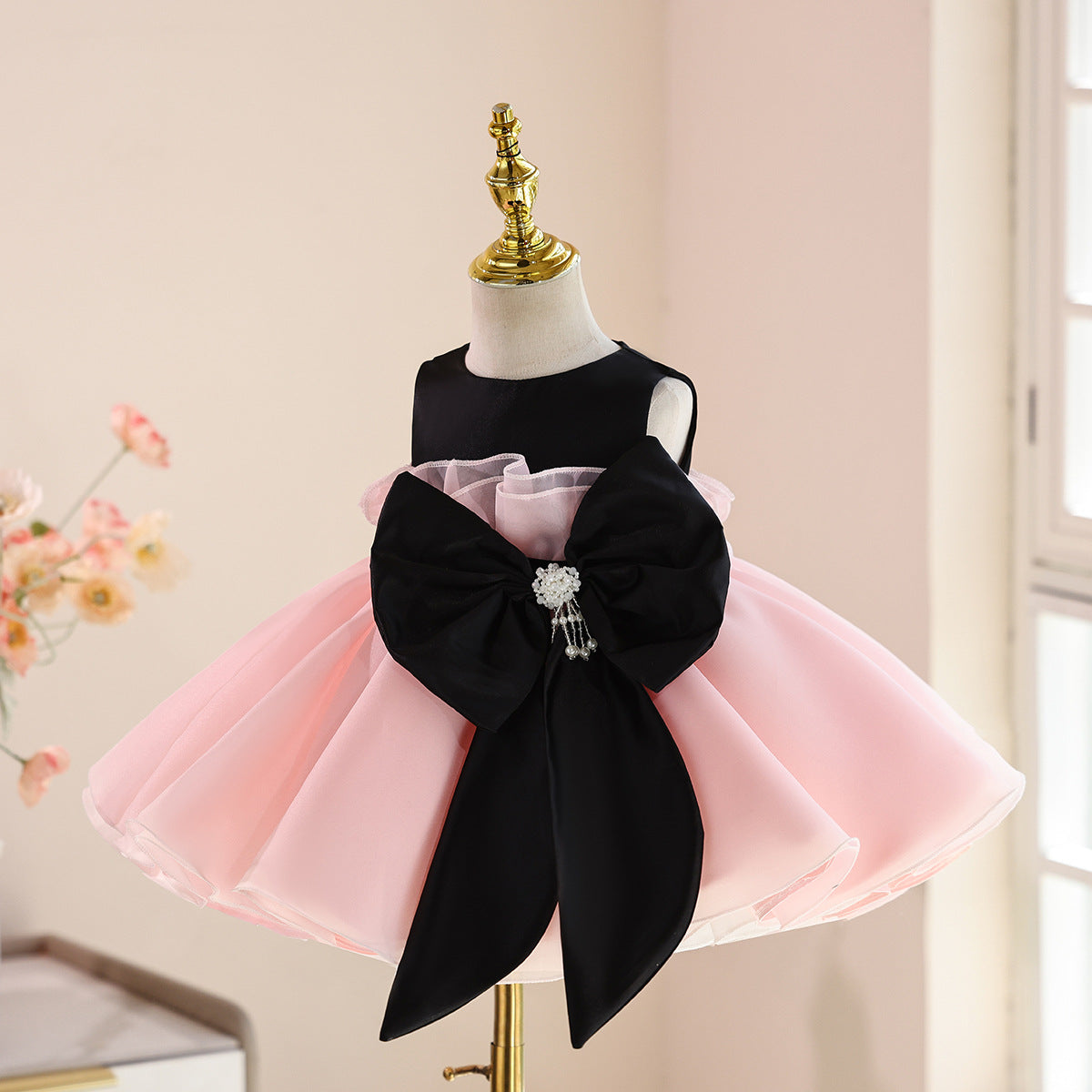 Abito elegante bambina rosa e nero con maxi fiocco