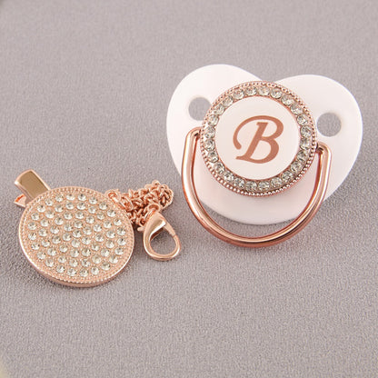 Set Ciuccio Luxury Bianco e oro rosa con Clip – Personalizzato con Iniziale (6-12 mesi)