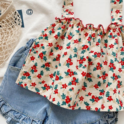 Completo estivo bambina: top floreale con bretelle e shorts in denim