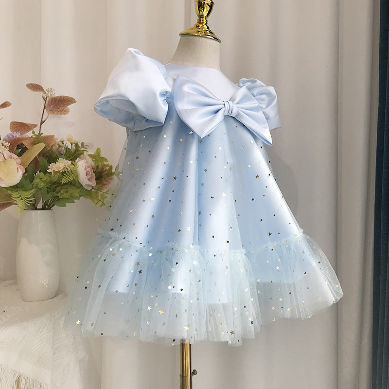 Abito Celeste Bimba con Tulle Stellato e Fiocco Elegante