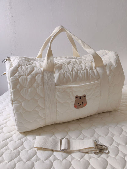 Borsone trapuntata bianca con patch animaletti