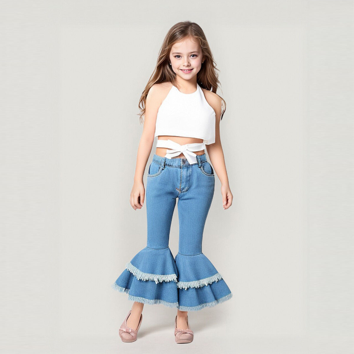 Completo Bambina Top Elegante Bianco e Jeans a Zampa con Volant