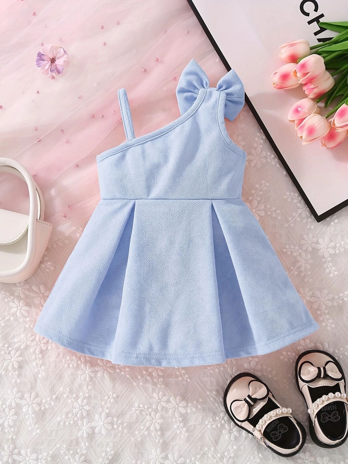 Vestitino elegante bambina azzurro – Monospalla con fiocchi