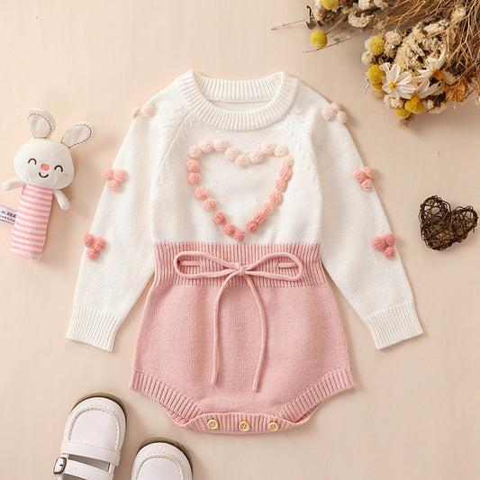 Pagliaccetto  in maglia bimba con cuore in rilievo rosa