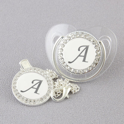 Set Ciuccio Trasparente e argento  Luxury con Clip – Personalizzato con Iniziale 6-12 mesi