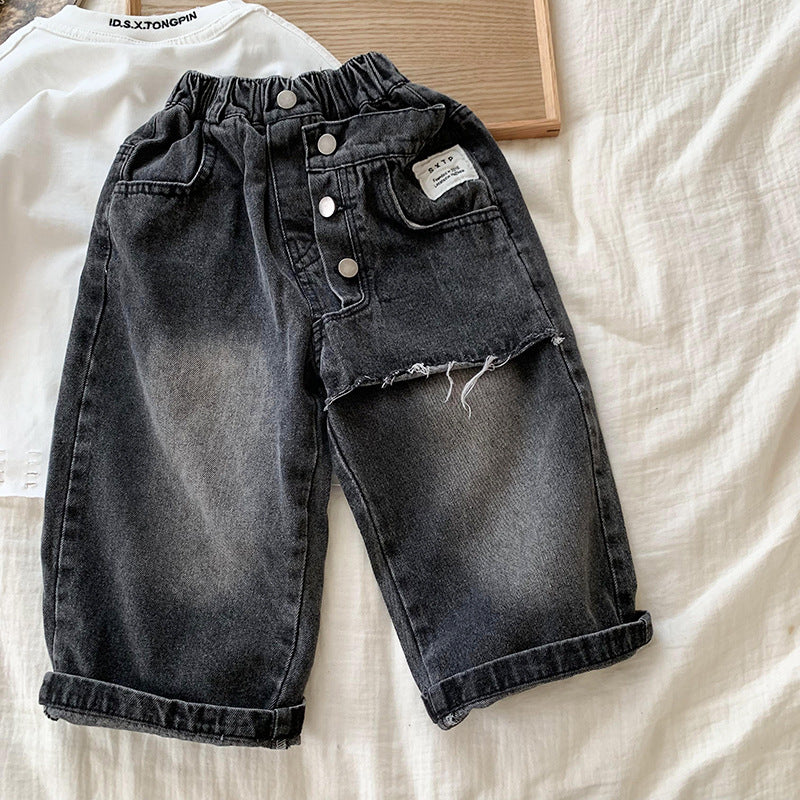 Jeans Bambino Nero Vintage con Strappo e Dettagli Asimmetrici