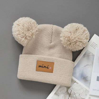 Cappellino in maglia “Mini” con doppio pompon – Invernale, caldo e morbido