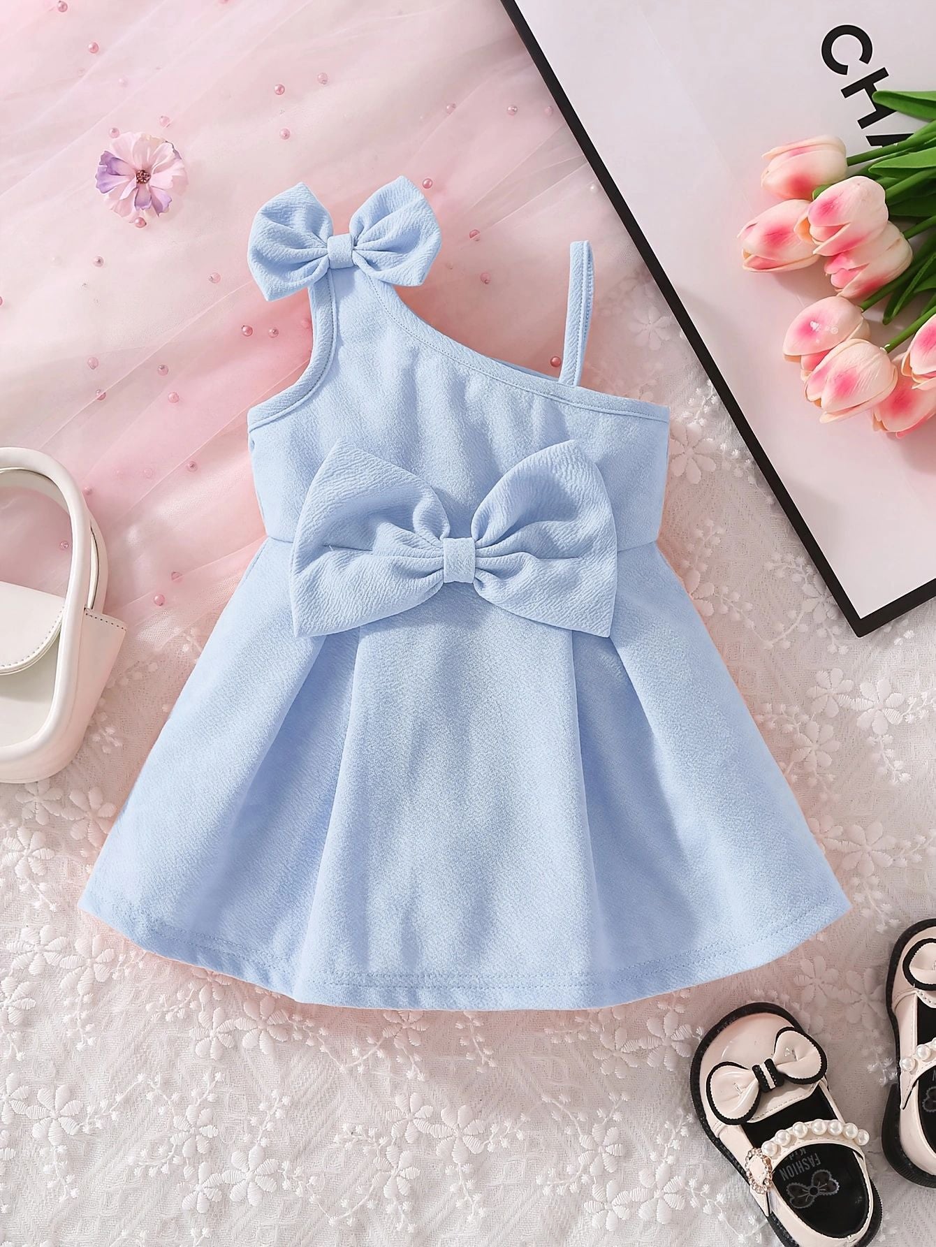 Vestitino elegante bambina azzurro – Monospalla con fiocchi