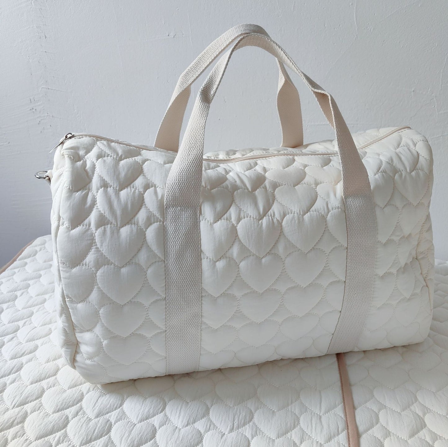 Borsone trapuntata bianca con patch animaletti