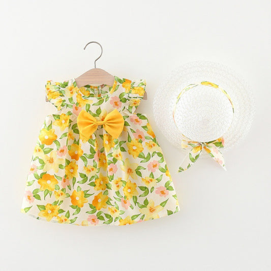 Vestitino Floreale Giallo con Cappellino Coordinato – Edizione Sole d’Estate