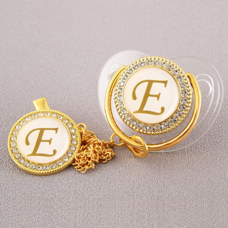 Set Ciuccio Trasparente e oro  Luxury con Clip – Personalizzato con Iniziale 6-12 mesi