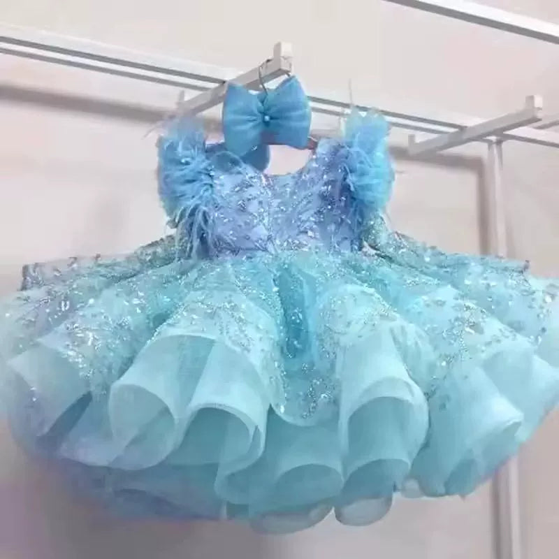 Vestito cerimonia elegante bambina con piume e ricami glitter