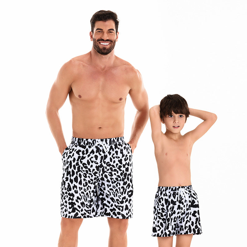 Costumi coordinati famiglia – Stampa animalier bianco e nero