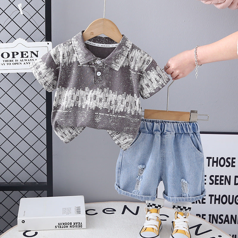 Completo Bimbo Polo Stampata e Pantaloncini Denim Strappati