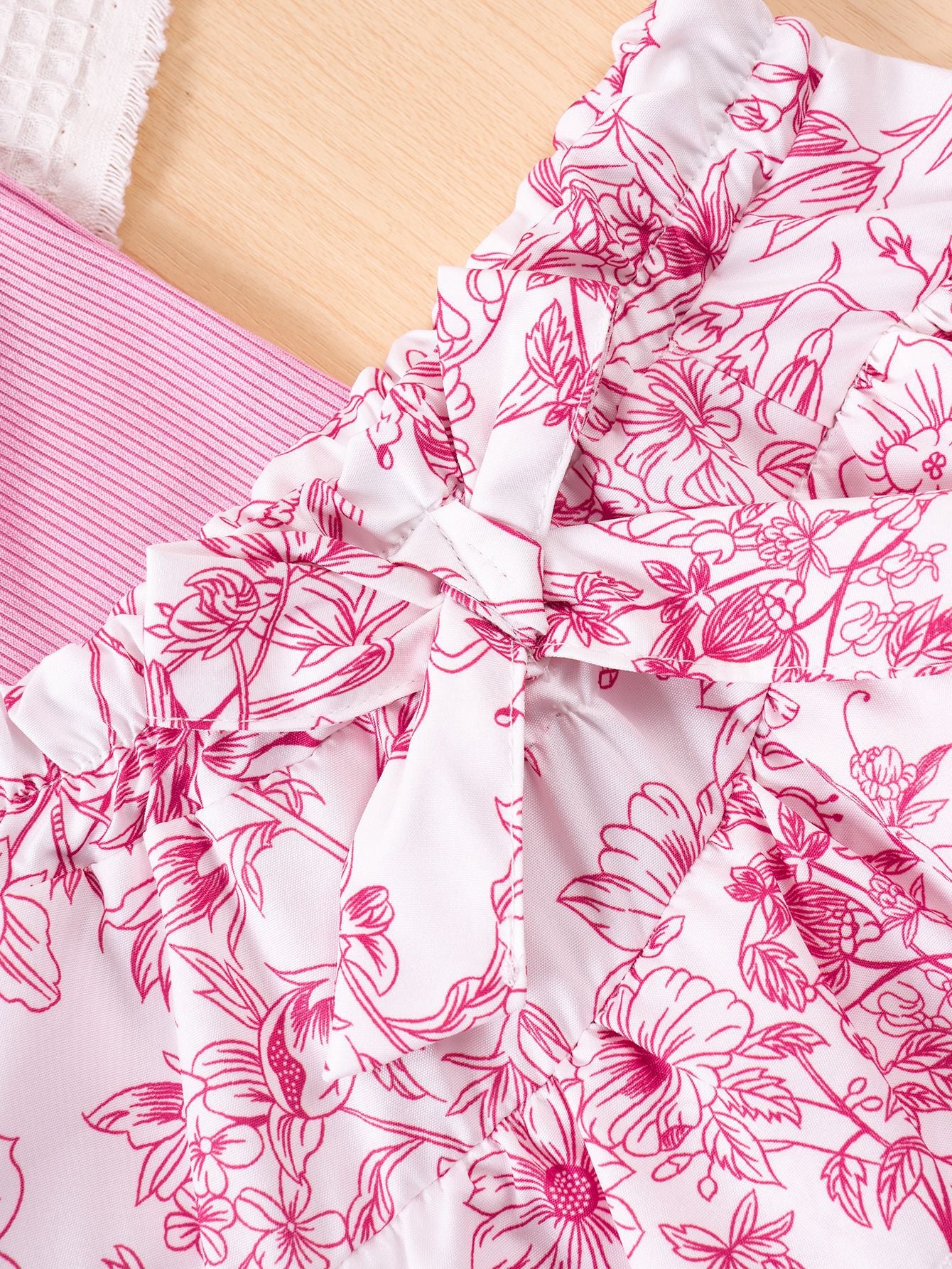 Completo Estivo Bimba – Top Rosa con Volant e Gonna a Balze Floreale