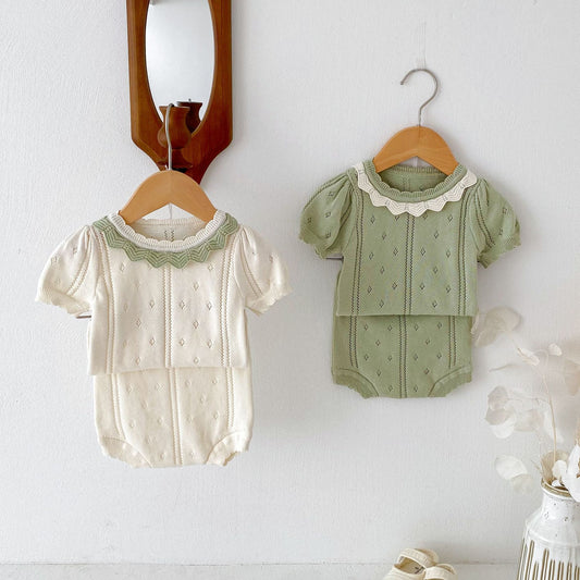 Completino estivo in maglia traforata per neonata con colletto decorato  2 colori