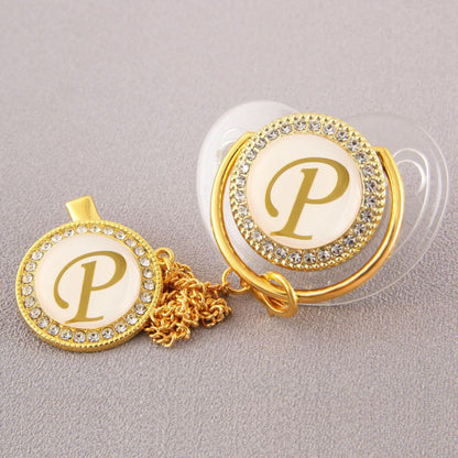 Set Ciuccio Trasparente e oro  Luxury con Clip – Personalizzato con Iniziale 6-12 mesi