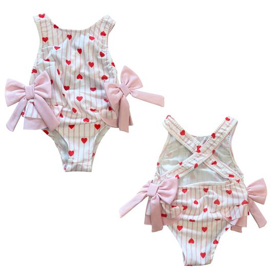Costume intero bambina con cuori e maxi fiocchi